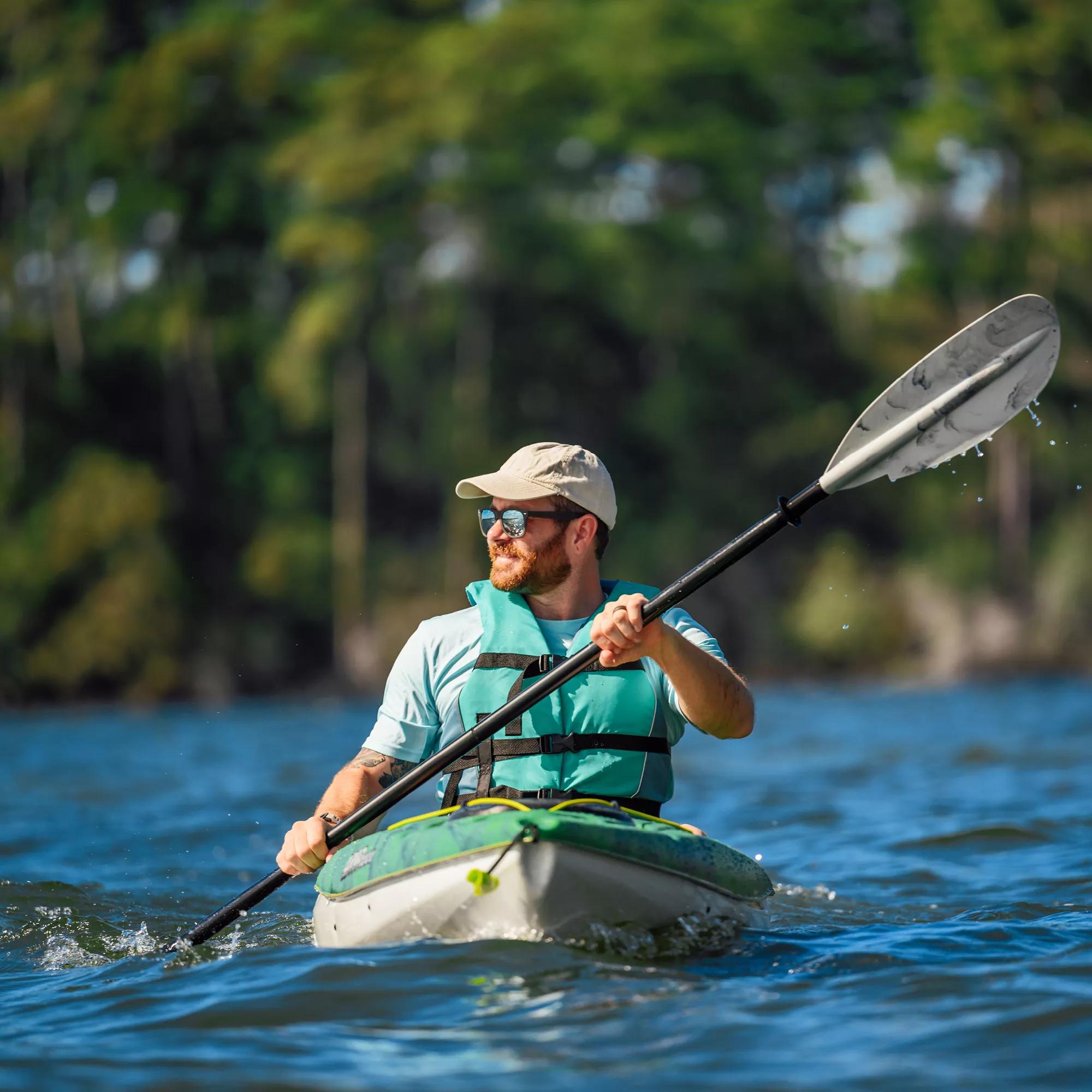 Orange and white Pelican Argo 80x sit in kayak and accessories